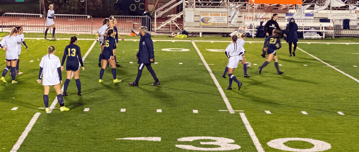 Roberto coaching college soccer in Portland, Oregon